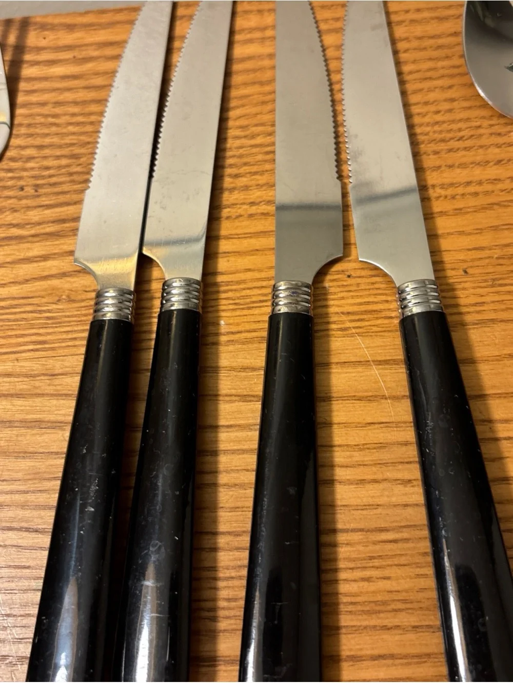 Black-Handled Stainless Steel Flatware Set - 12-Piece